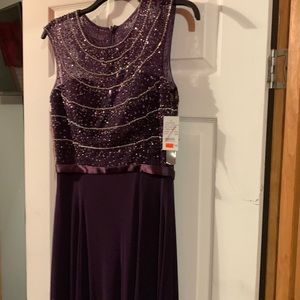 Purple prom dress with lots of dazzle on top silk bottom